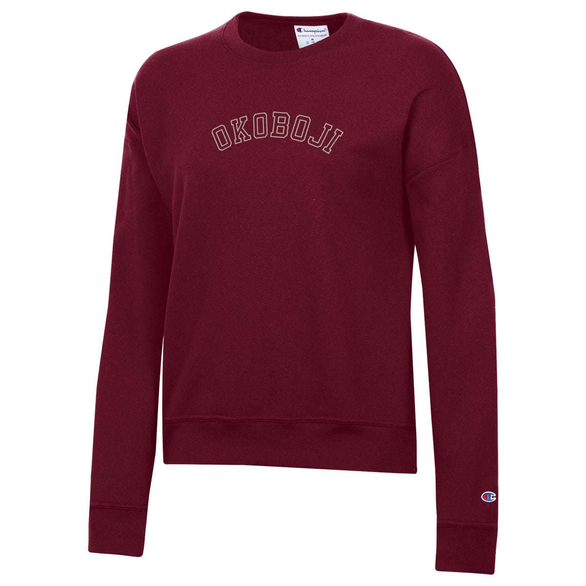 Maroon Champion womens Powerblend crewneck sweatshirt with outlined arched OKOBOJI chest graphic